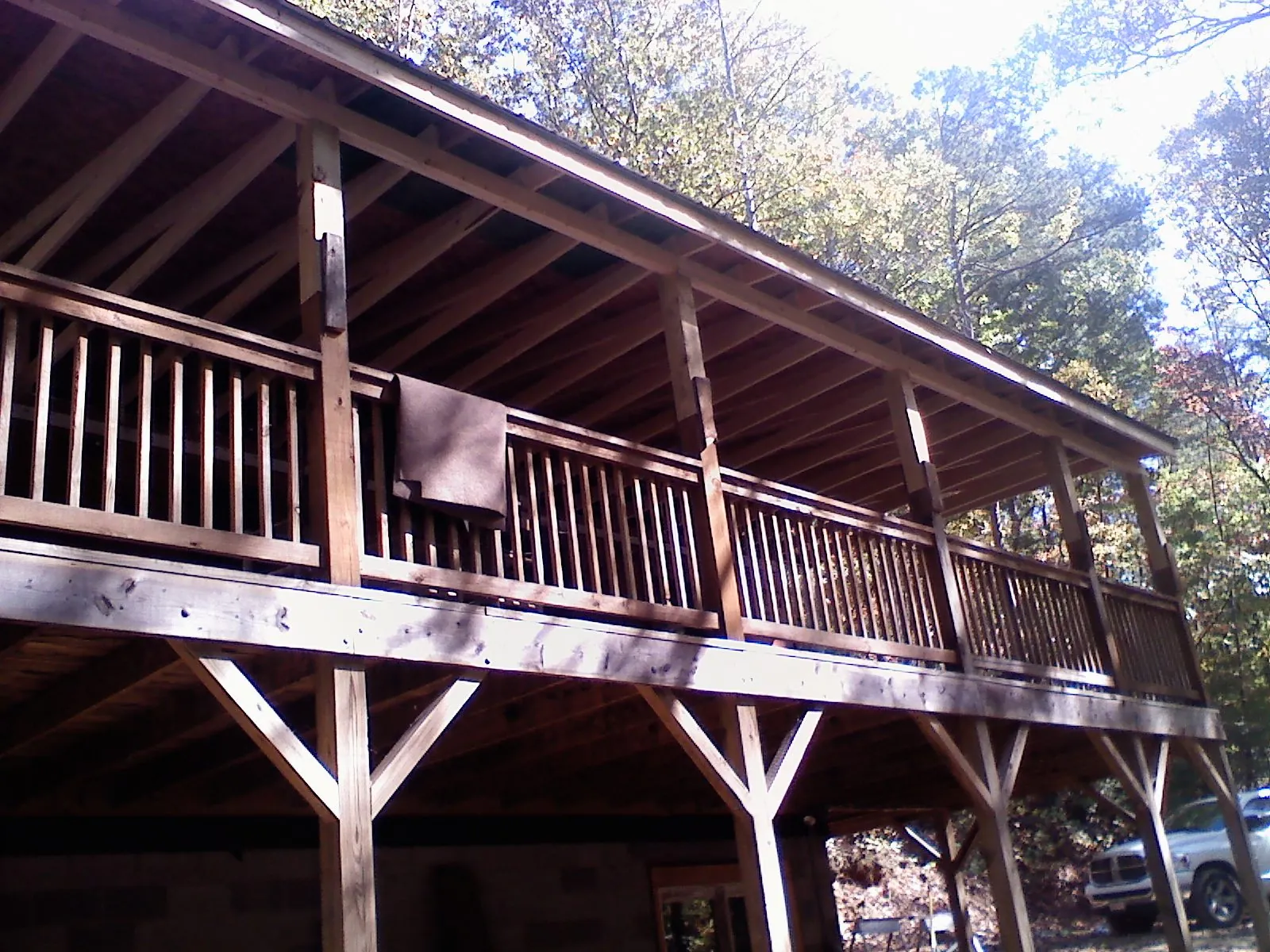 Timber framing under a new elevated porch and deck — Roof Leak Repair in Maurice by Roofing Brothers